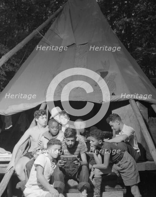 Comic papers, Camp Nathan Hale, Southfields, New York, 1943. Creator: Gordon Parks.