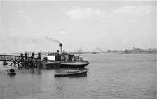 A car ferry unloads at Gravesend, Kent, c1945-c1965. Artist: SW Rawlings