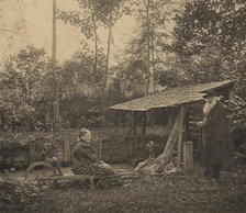Camille Pissarro and Julie at the washhouse, Eragny, c1884-1903. Creator: Unknown.