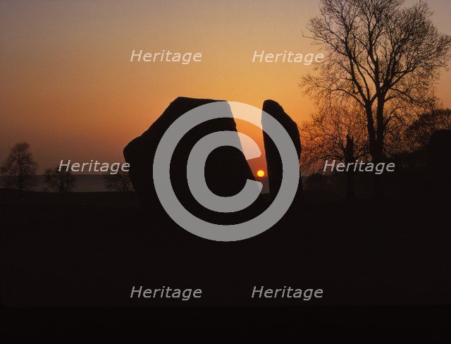 Sunrise on Megalithic Circle, Avebury, Wiltshire, 20th century. Artist: CM Dixon.