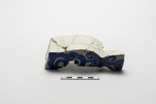 Fragment of an underglaze cobalt-blue-painted wall tile, (18th century?). Creator: Unknown.