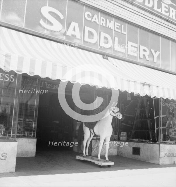 Storefront of San Joaquin Valley town, Fresno, on U.S. 99, California, 1939. Creator: Dorothea Lange.