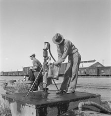 Drinking water for the whole town, also for the..., Tulelake, Siskiyou County, California, 1939. Creator: Dorothea Lange.