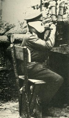 Russian soldier using a periscope rifle, First World War, 1914-1918, (c1920). Creator: Unknown.