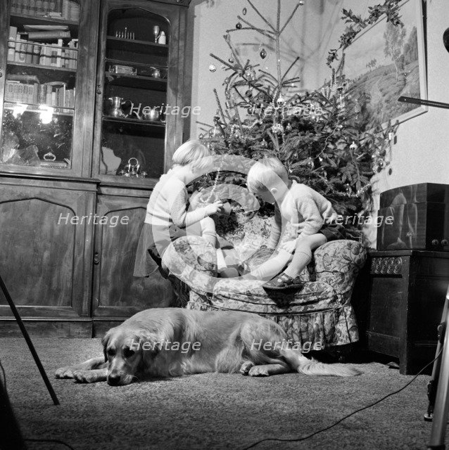 Christmas time, 1960. Artist: John Gay.