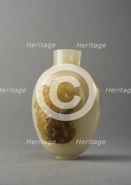 Jade snuff bottle with raised carving of animals, China, Qing dynasty, 1644-1911. Creator: Unknown.
