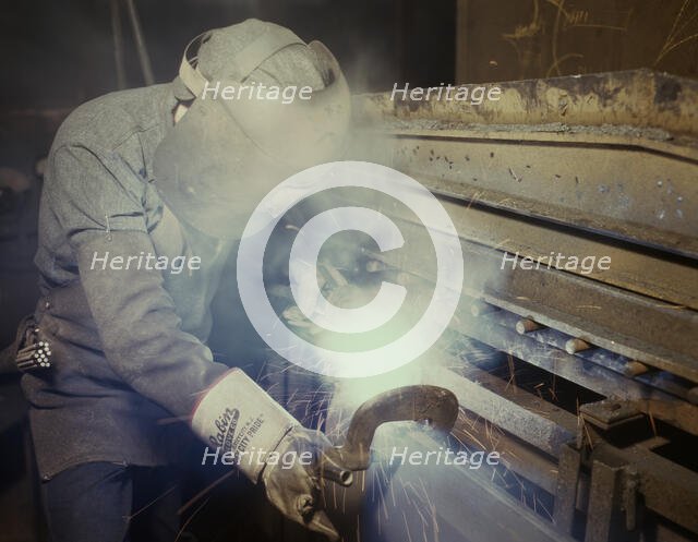 Welder making boilers for a ship, Combustion Engineering Co., Chattanooga, Tenn., 1942. Creator: Alfred T Palmer.