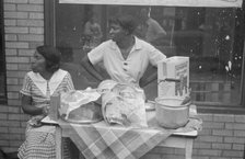 Women selling ice cream and cake, Scotts Run, West Virginia, 1935. Creator: Walker Evans.