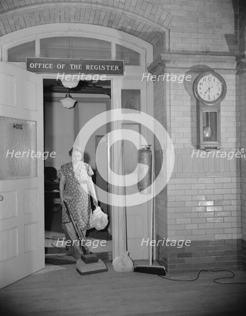 Government charwoman cleaning after regular hours, Washington, D.C., 1942. Creator: Gordon Parks.