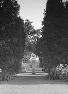 Statue by Paul Manship in the Griffin or Nissen Garden, 1931 June 14. Creator: Arnold Genthe.