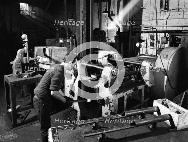 The process of forging heads at the Edgar Allen Steel Foundry, Sheffield, South Yorkshire, 1962. Artist: Michael Walters