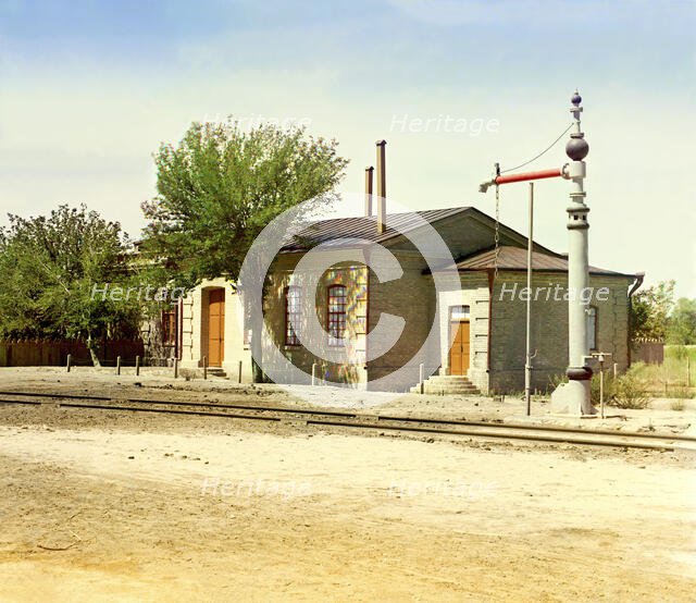 Railroad station with water crane and tracks, between 1905 and 1915. Creator: Sergey Mikhaylovich Prokudin-Gorsky.