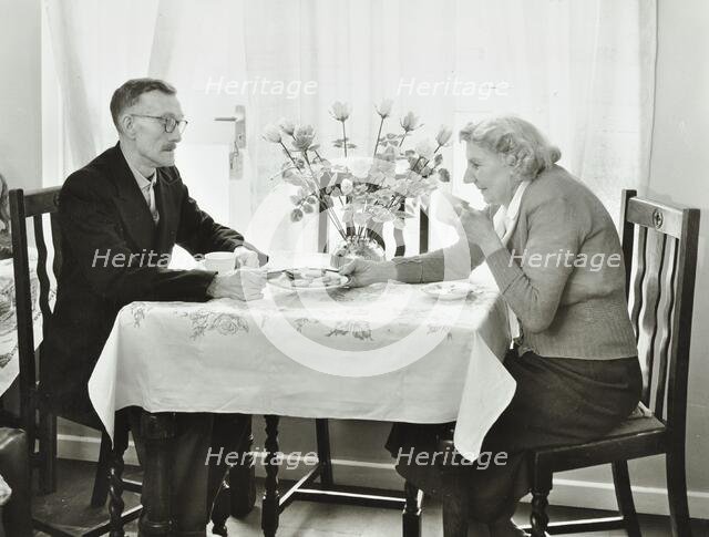 16 Candy Street, Poplar, London: elderly couple in a new flat, 1962. Creator: Unknown.