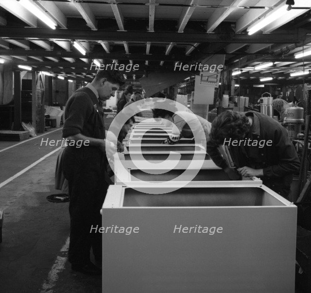 Fridge assembly line at the General Electric Company, Swinton, South Yorkshire, 1964.  Artist: Michael Walters