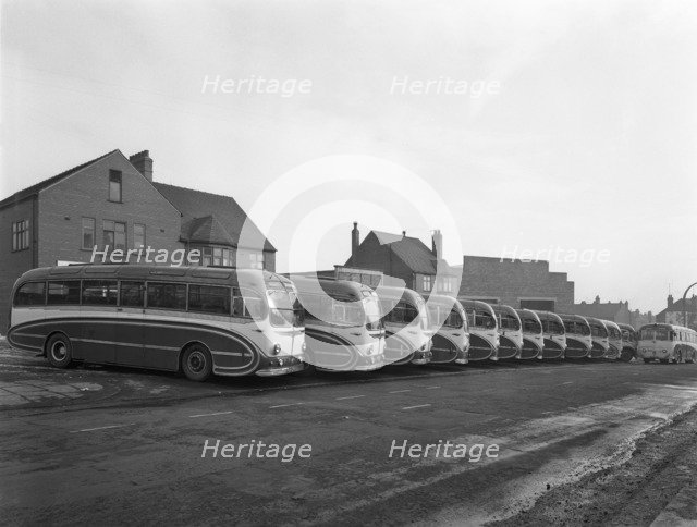 Fleet of Phillipson's coaches, Goldthorpe, South Yorkshire, 1963.  Artist: Michael Walters