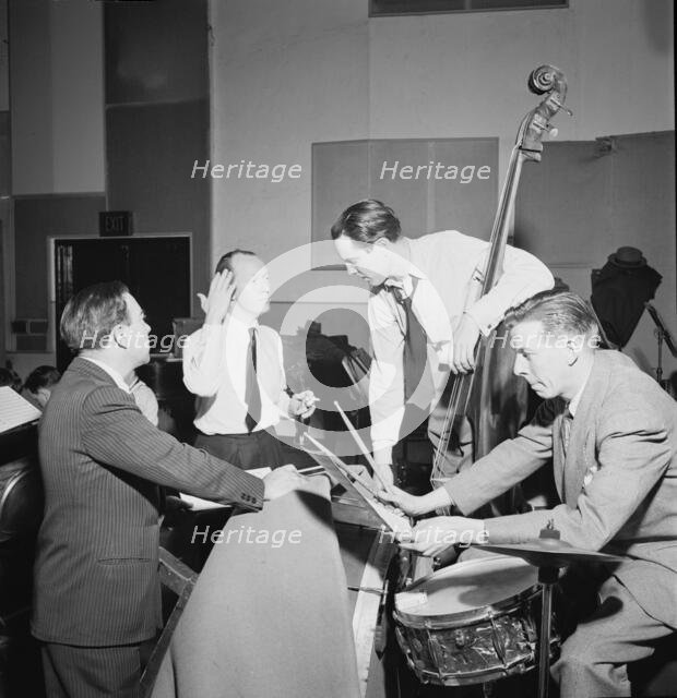 Portrait of Bob Haggart, Morey Feld, and Mack Shopnick, New York, N.Y.(?), ca. July 1947. Creator: William Paul Gottlieb.