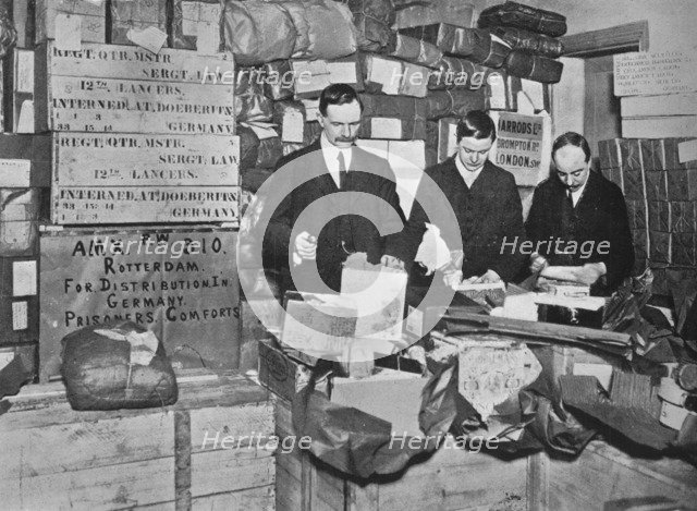 'Packing gifts for despatch to British prisoners in Germany', 1915. Artist: Unknown.