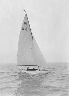 The 18-foot keelboat 'Prudence' (K2) under sail, 1922. Creator: Kirk & Sons of Cowes.