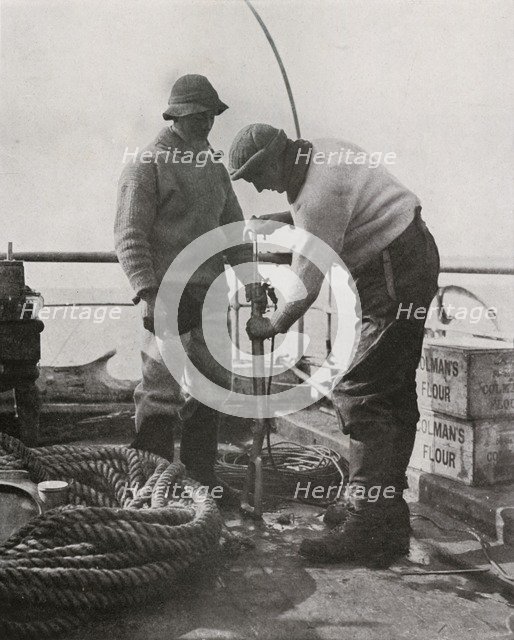 'Dr. Wilson and Dr. Atkinson Loading The Harpoon Gun', c1910–1913, (1913). Artist: Herbert Ponting.