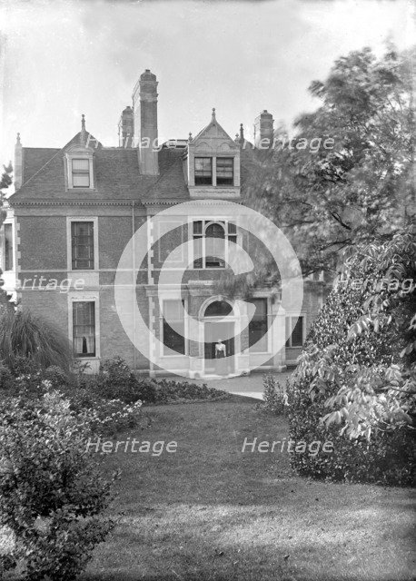 House and garden, c1900.  Creator: Kirk & Sons of Cowes.