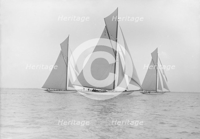 The 19-metre class 'Norada', 'Wendula' & 'Mariquita' racing close-hauled, 1911. Creator: Kirk & Sons of Cowes.