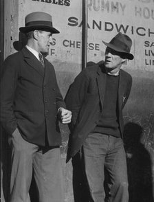 Unemployed men on Howard Street, San Francisco, California, 1937. Creator: Dorothea Lange.