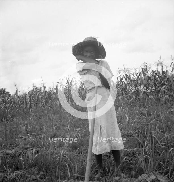 Negro girl working in the fields, Mississippi Delta, 1936. Creator: Dorothea Lange.