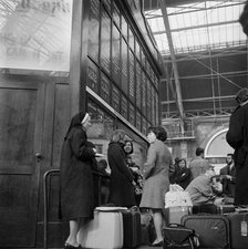 Passengers at Victoria Station, London, 1960-1972. Artist: John Gay