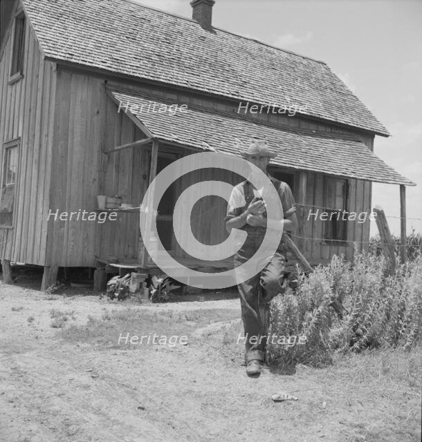 Former tenant farmer on a large cotton farm, Bell County, Texas, 1937. Creator: Dorothea Lange.