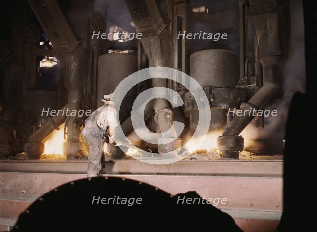 TVA chemical plant, electric furnace loaded with phosphate, vicinity of Muscle Shoals, Alabama, 1942 Creator: Alfred T Palmer.