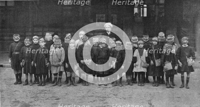 'Les enfants d'une des ecoles primaires de Reims, avec leurs masques contre les gaz..., 1916. Creator: Unknown.