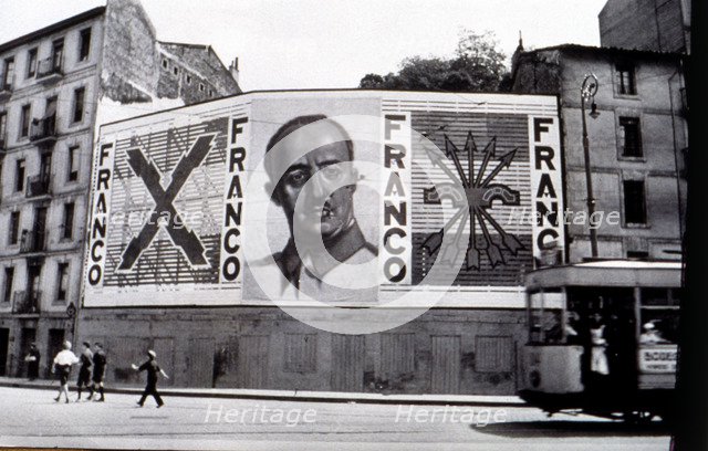 Spanish Civil War (1936 - 1939), nationalist painting with the face of Franco and symbols of the …