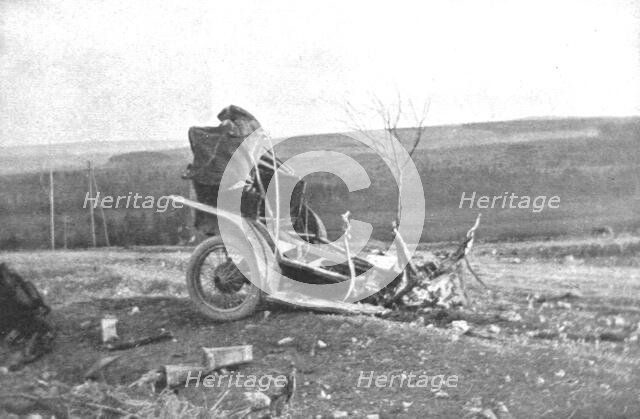'Au Volant; Automobile de liaison fracassee lar un projectile, le mars 1916, a l'Ouest de..., 1916. Creator: Unknown.