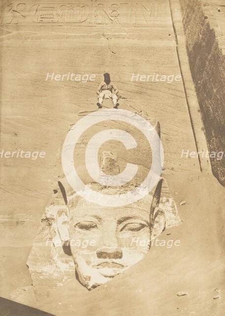 Westernmost Colossus of the Temple of Re, Abu Simbel, 1850. Creator: Maxime du Camp.