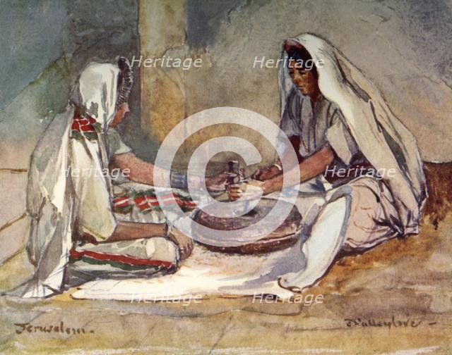 'Two Women Grinding at a Hand Mill', 1902. Creator: John Fulleylove.