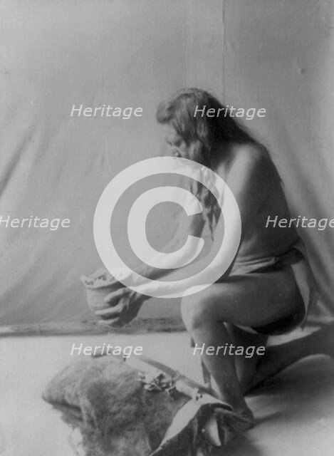 Incense over a medicine bundle, c1908. Creator: Edward Sheriff Curtis.