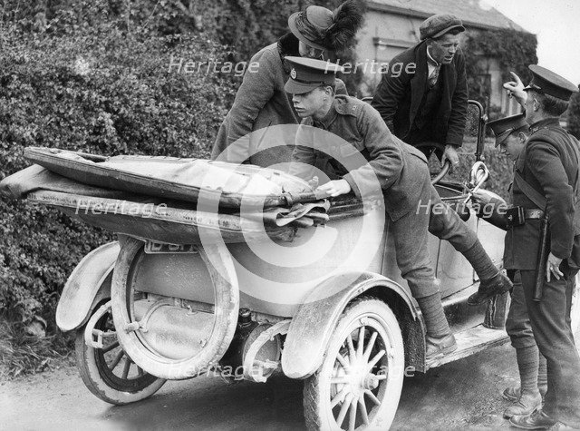 Soldiers performing a spot check on a car, c1910s(?). Artist: Unknown