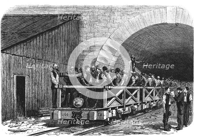 Tunnel opening of the Alps, workers exiting after a working day by the French mouth of Mont - Cen…