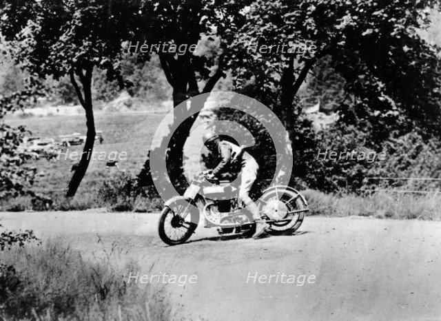A man on a Norton bike taking part in the Belgian Grand Prix, 1924. Artist: Unknown