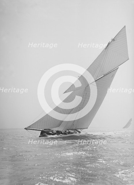 The gaff rigged cutter 'Bloodhound' sailing close-hauled, 1911. Creator: Kirk & Sons of Cowes.