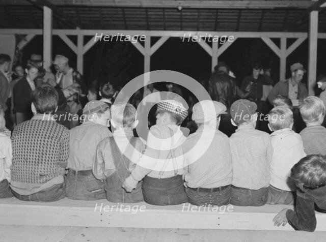 Halloween party at Shafter camp for migrants, California, 1938. Creator: Dorothea Lange.
