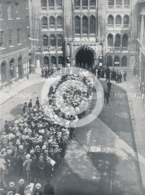Waiting to enter the Guildhall for Mr. Asquith's first great call to arms meeting, 1914. Artist: Unknown