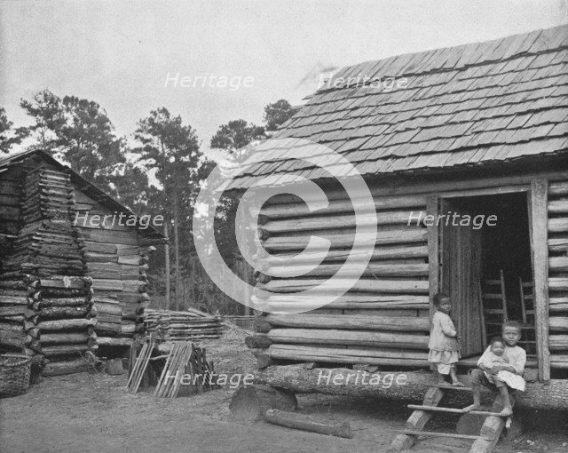 'Negro Log Huts', Thomasville, Georgia, USA, c1900. Creator: Unknown.