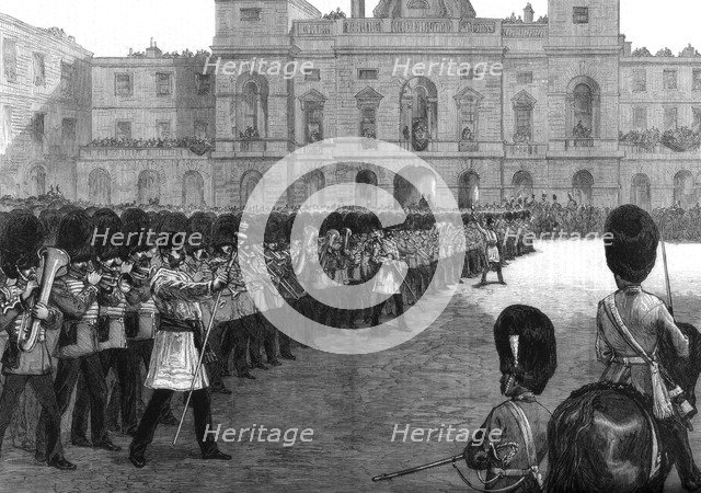 'Guards trooping the colours in St James's Park on Her Majesty's birthday', 1875. Artist: Unknown