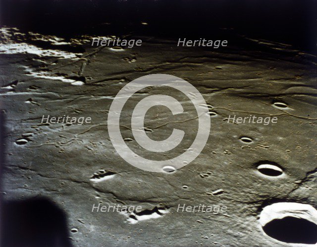 Lunar Module approaching landing site on the Moon, Apollo II mission, July 1969. Creator: NASA.
