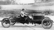 Miss Dorothy Levitt, in a 26hp Napier, Brooklands, 1908. Artist: Unknown