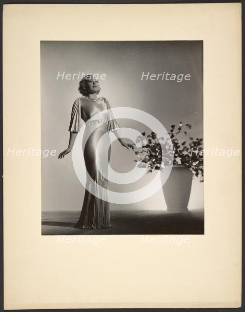 Portrait of woman in gown, late 1930s. Creator: Gunther Krampf.