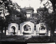 Hall of Classics (Guozijian), Peking: a triple archway of sculpted marble leading... 1871, (1981). Creator: Unknown.
