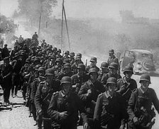 German Soldiers Marching Down a Road, 1941. Creator: British Pathe Ltd.