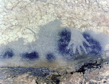 Panel of the points horses (Paintings Room, Pech-Merle Cave): detail of a hand in negative in bla…